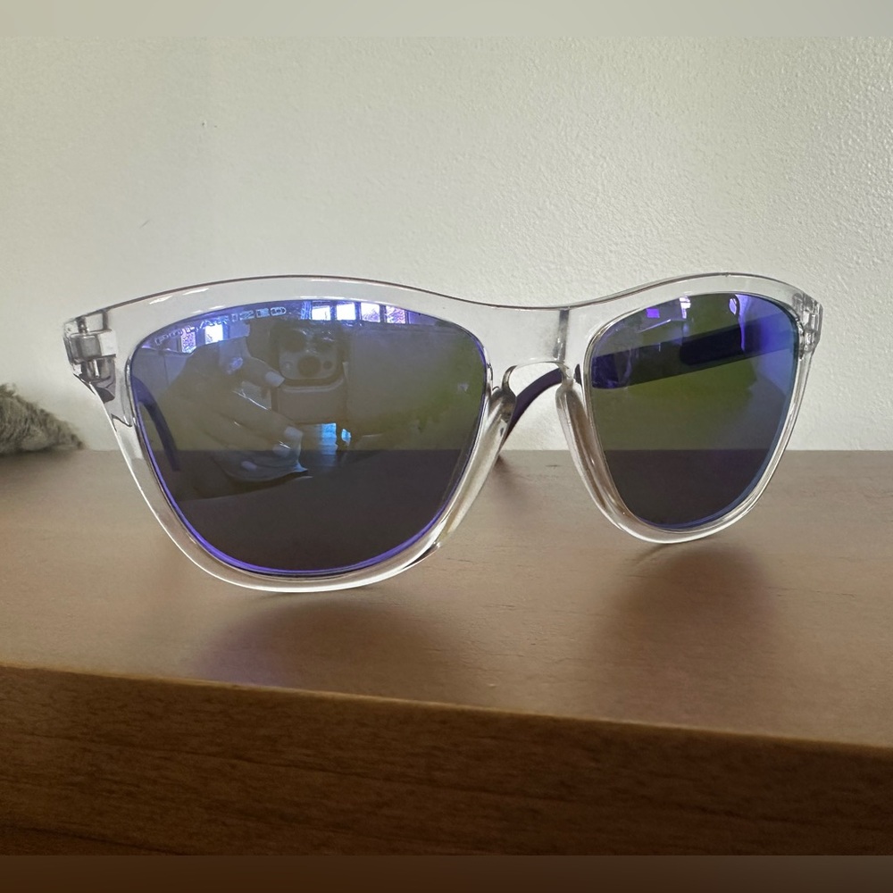Women’s Oakley Sunglasses with Purple accented arms.